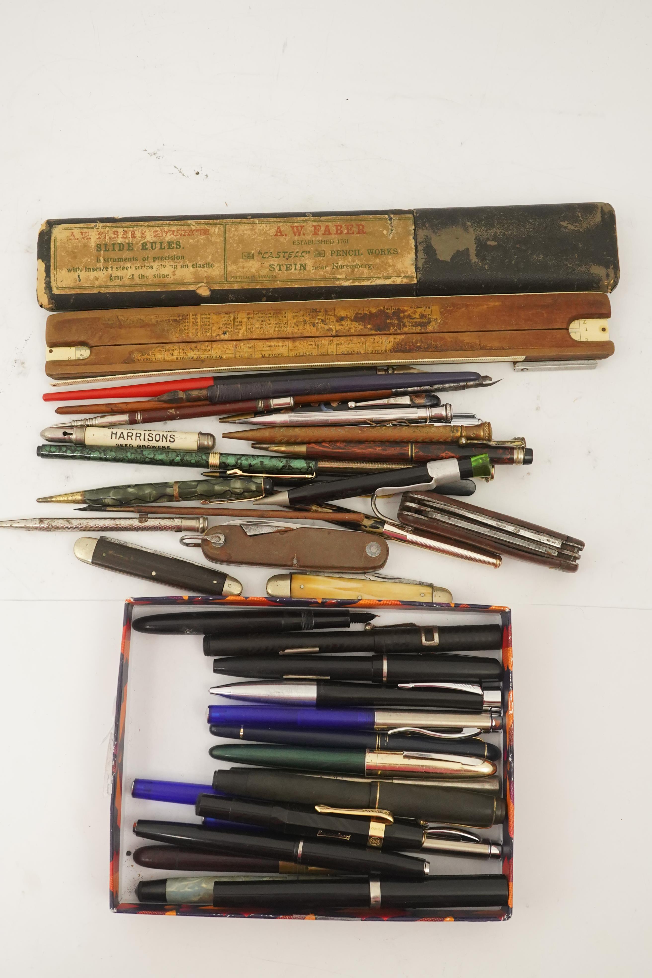 A collection of pens, etc. from 1950's and later and a collection of propelling pencils from 1930's and later, four penknives and a slide rule